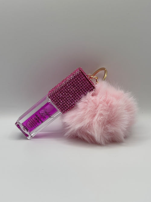 Cherry bling lip oil with pink puff
